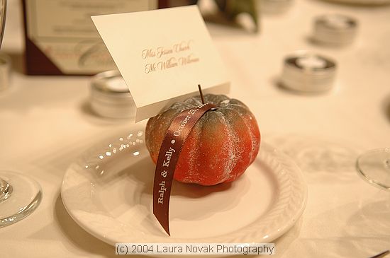 Escort card pumpkins in keeping with the fall theme